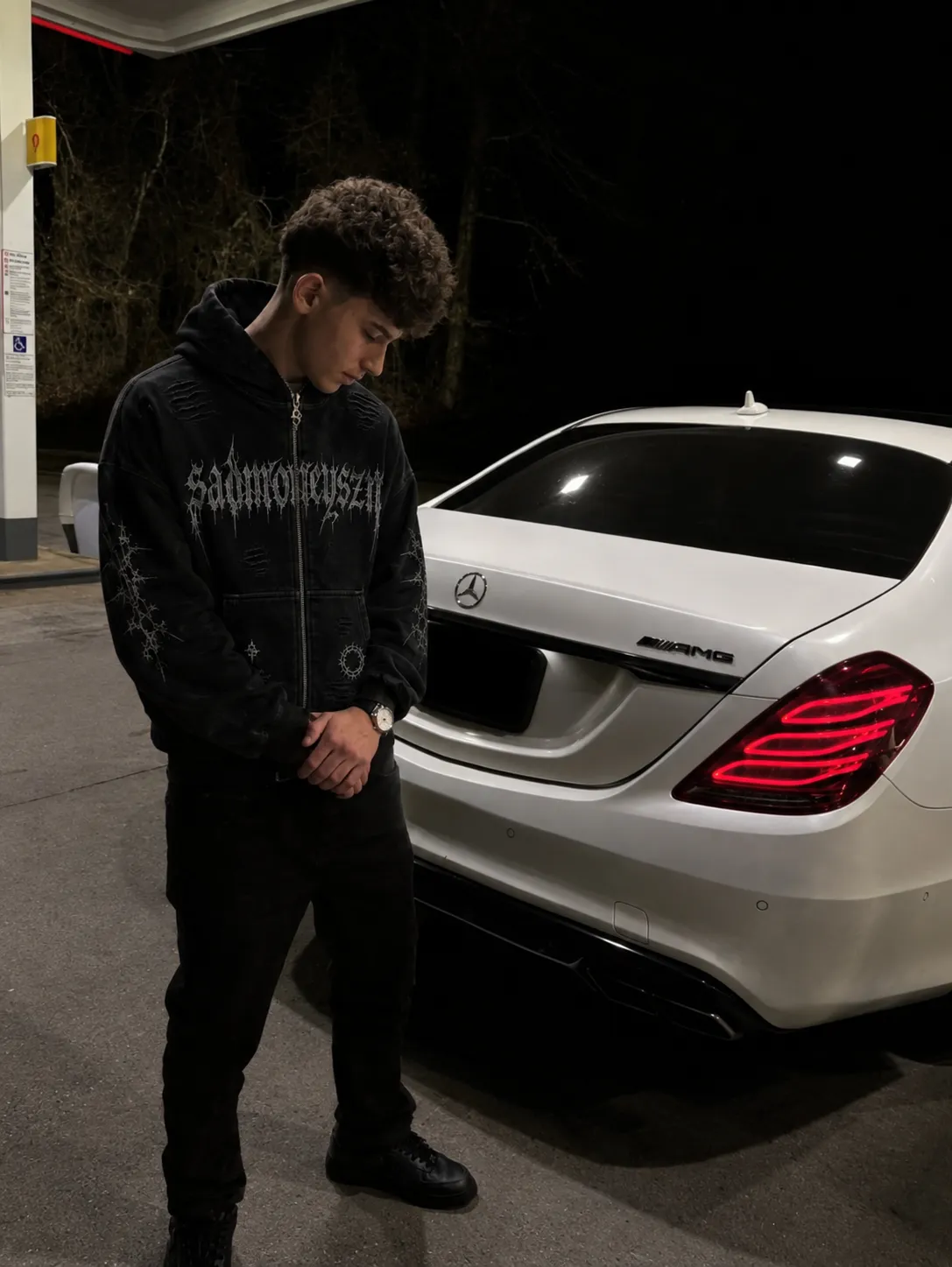 SADMONEYSZN® onyx tracksuit worn at night